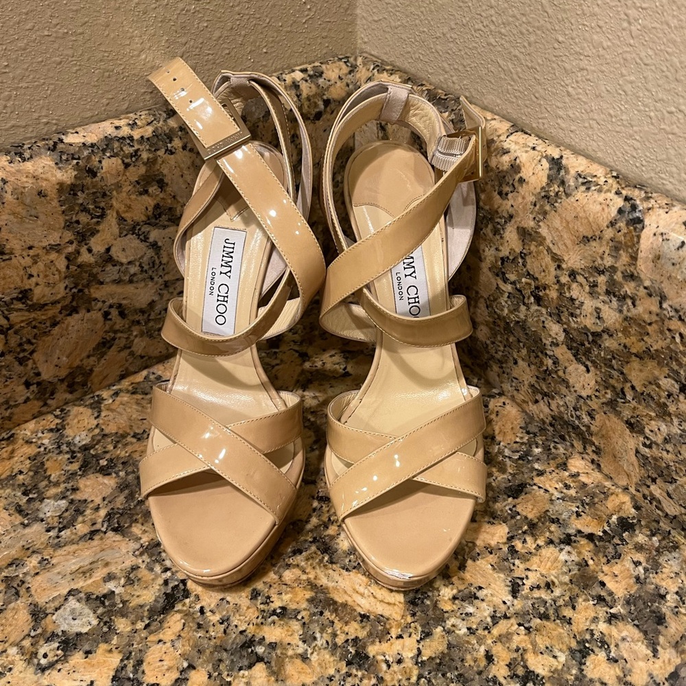 Women’s heels, Jimmy Choo, have been worn but still in good condition.